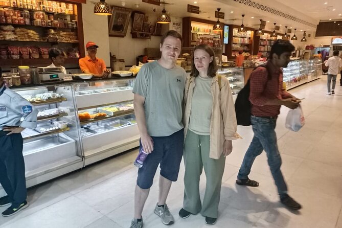 Feast on the Streets: Best Jaipur Food Tour - Govind Devji Temple: food beside living culture